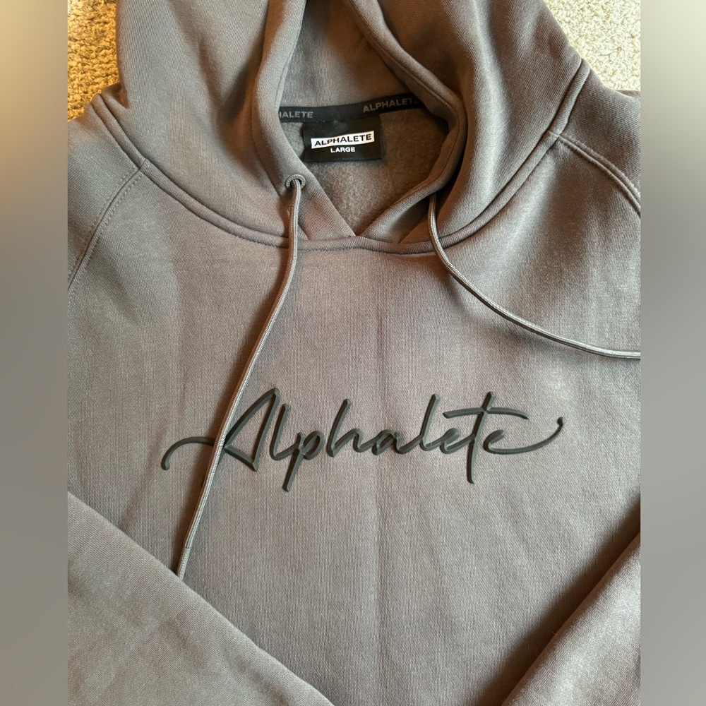 ALPHALETE WOMENS HOODIE SIZE L NEVER WORN